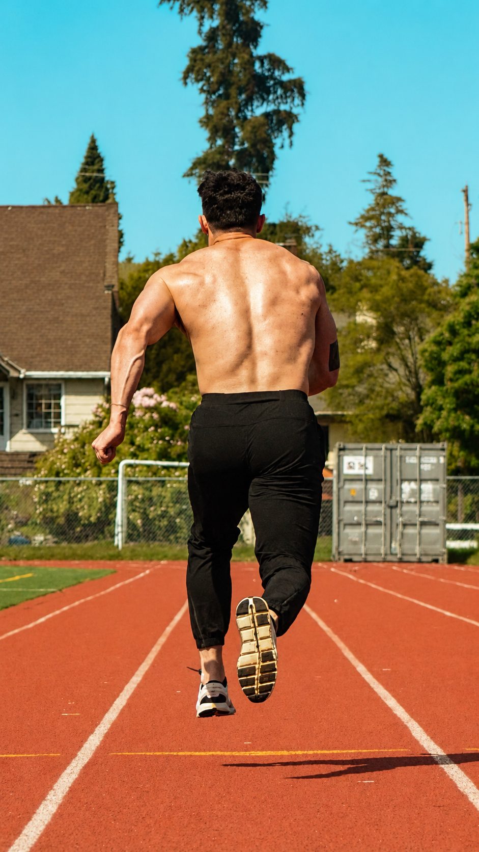 Devon Baker sprinting on an outdoor track